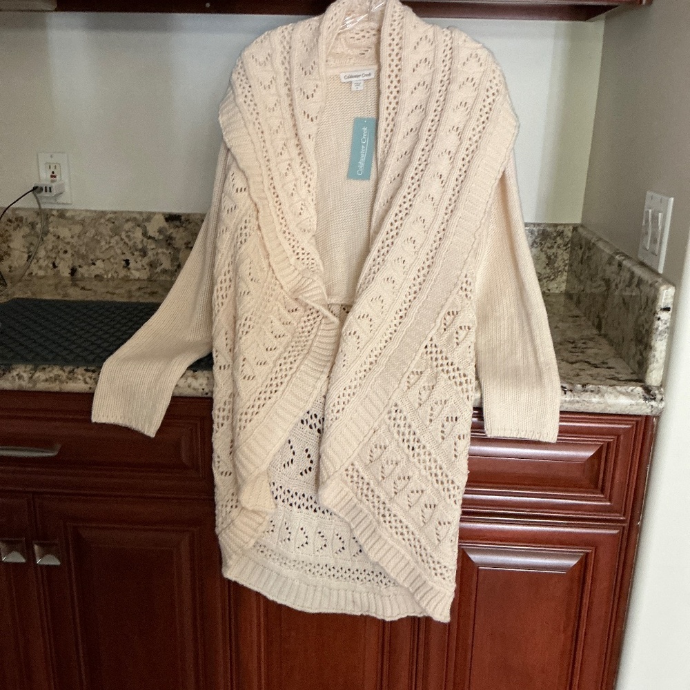 New, with tags, cardigan from Coldwater Creek, size small.